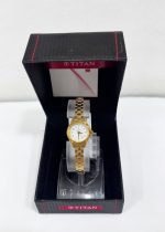 Titan Quartz Analog White Dial Stainless Steel Strap Watch for Women