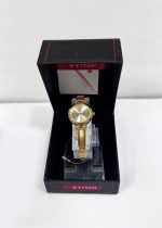 Titan Karishma Champagne Dial Women Analog Watch With Stainless Steel Strap