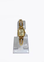 Titan Quartz Analog Champagne Dial Stainless Steel Strap Watch for Women